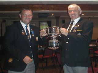 President Brown of Gourock Park presents Gourock's President John McVicar with the New Trophy